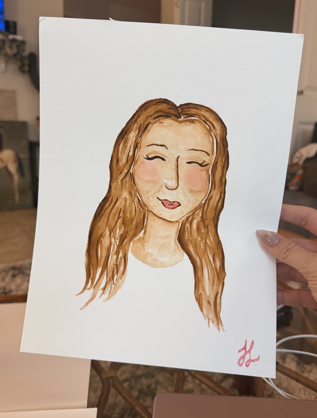 Watercolor portrait commission of a young woman with long auburn hair, painted from a photograph
